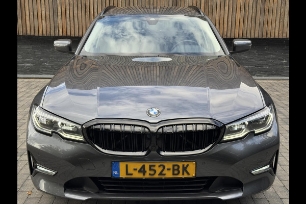 BMW 3 Serie Touring 320e High Executive Automaat | Trekhaak elektrisch | Navigatiesysteem | Laser LED | Draadloze telefoonlader | Apple CarP