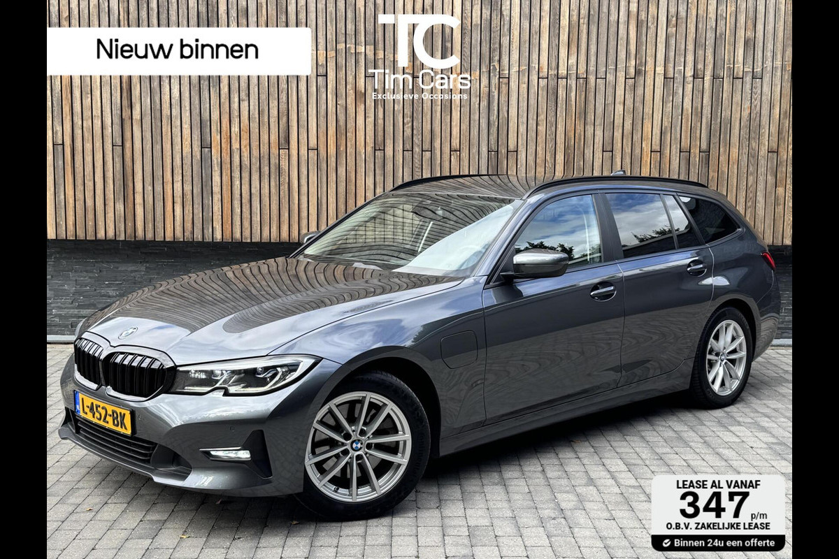 BMW 3 Serie Touring 320e High Executive Automaat | Trekhaak elektrisch | Navigatiesysteem | Laser LED | Draadloze telefoonlader | Apple CarP BMW 3 Serie Touring 320e High Executive Automaat | Trekhaak elektrisch | Navigatiesysteem | Laser LED | Draadloze telefoonlader | Apple CarP
