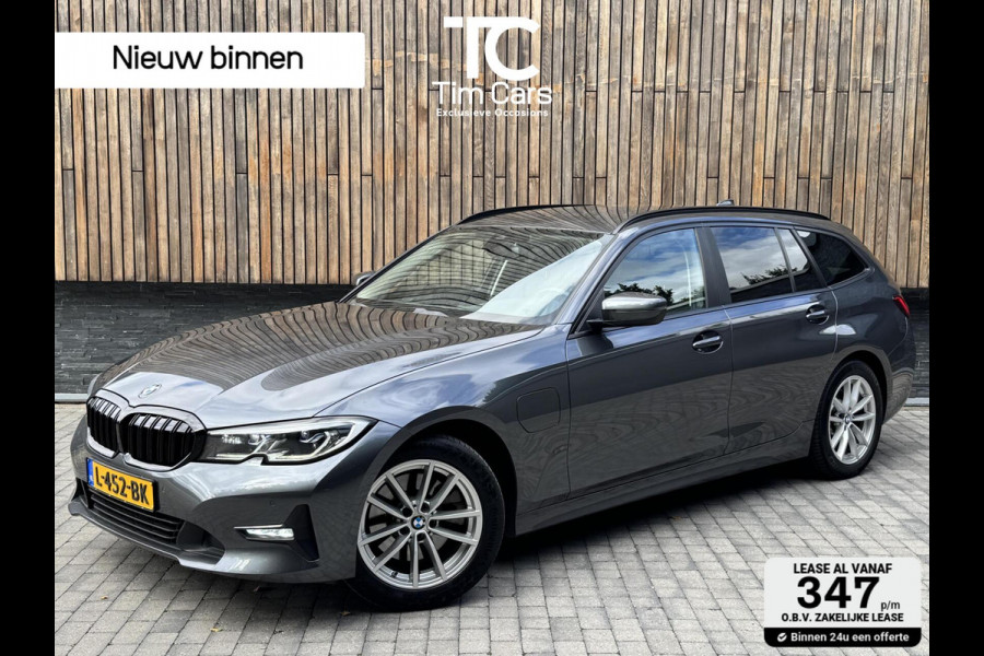 BMW 3 Serie Touring 320e High Executive Automaat | Trekhaak elektrisch | Navigatiesysteem | Laser LED | Draadloze telefoonlader | Apple CarP