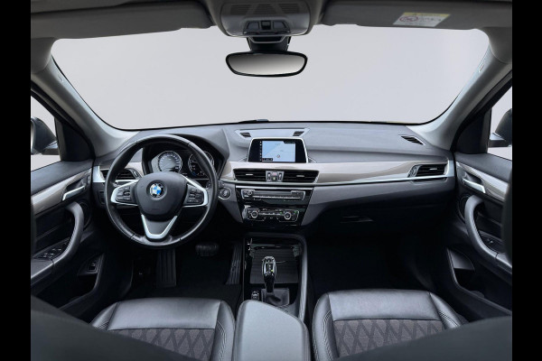 BMW X1 SDrive20i 192 pk High Executive, panoramadak, trekhaak, 1/2 lederen sportinterieur