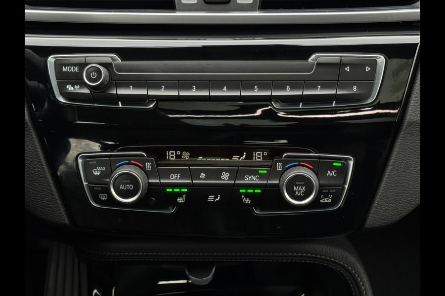 BMW X1 SDrive20i 192 pk High Executive, panoramadak, trekhaak, 1/2 lederen sportinterieur