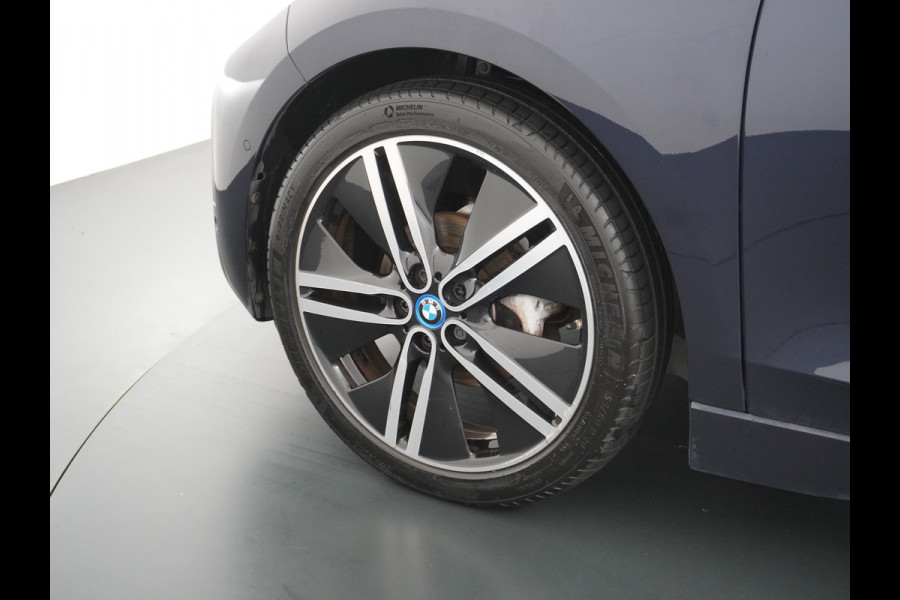 BMW i3 S iPerformance 94Ah 33kWh Schuifkanteldak Navi Ecc Cruise Control Camera Pdc DAB Stoelverwarming Warmtepomp Lmv 20" Led Comfort pack advance Origineel Nederlandse Auto