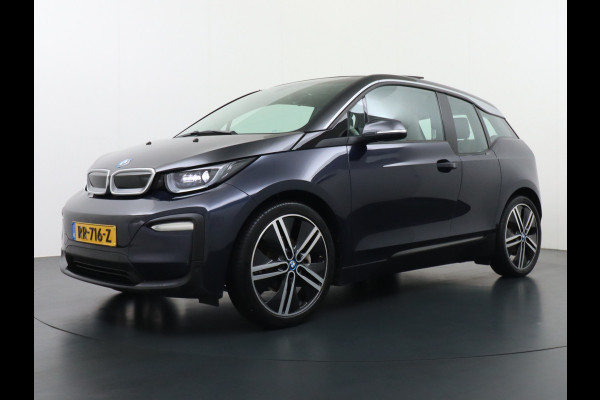 BMW i3 S iPerformance 94Ah 33kWh Schuifkanteldak Navi Ecc Cruise Control Camera Pdc DAB Stoelverwarming Warmtepomp Lmv 20" Led Comfort pack advance Origineel Nederlandse Auto