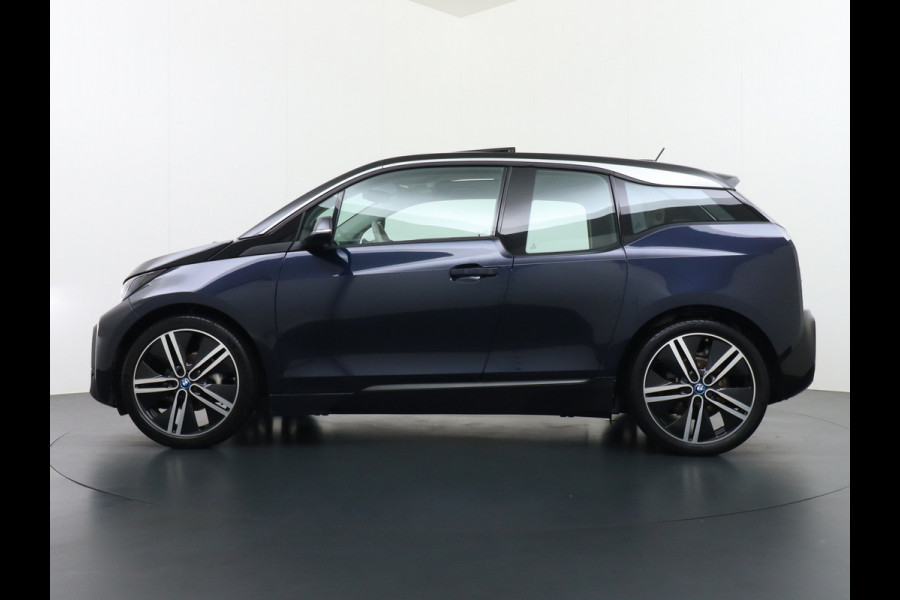 BMW i3 S iPerformance 94Ah 33kWh Schuifkanteldak Navi Ecc Cruise Control Camera Pdc DAB Stoelverwarming Warmtepomp Lmv 20" Led Comfort pack advance Origineel Nederlandse Auto
