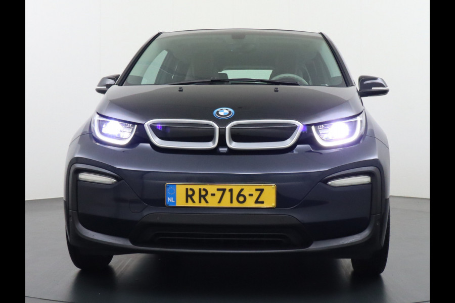 BMW i3 S iPerformance 94Ah 33kWh Schuifkanteldak Navi Ecc Cruise Control Camera Pdc DAB Stoelverwarming Warmtepomp Lmv 20" Led Comfort pack advance Origineel Nederlandse Auto