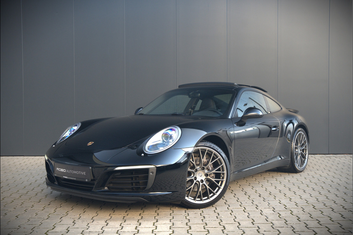 Porsche 911 3.0 Carrera | Panoramadak | Bose | Sport Chrono | Sport Uitlaat | Stoelverwarming | Stuurverwarming | Navigatie | Cruise Control | Leer | Origineel Nederlands | BTW | Parkeersensoren Porsche 911 3.0 Carrera | Panoramadak | Bose | Sport Chrono | Sport Uitlaat | Stoelverwarming | Stuurverwarming | Navigatie | Cruise Control | Leer | Origineel Nederlands | BTW | Parkeersensoren