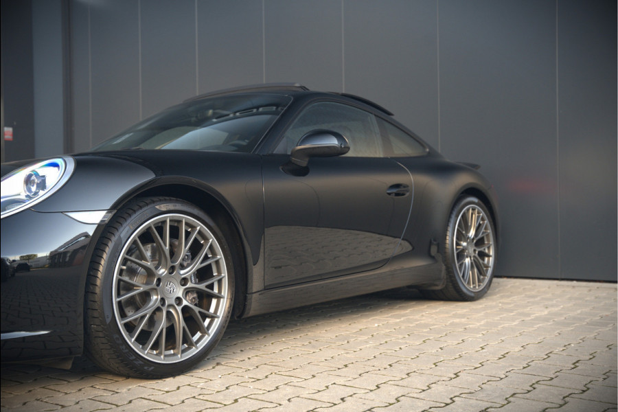 Porsche 911 3.0 Carrera | Panoramadak | Bose | Sport Chrono | Sport Uitlaat | Stoelverwarming | Stuurverwarming | Navigatie | Cruise Control | Leer | Origineel Nederlands | BTW | Parkeersensoren