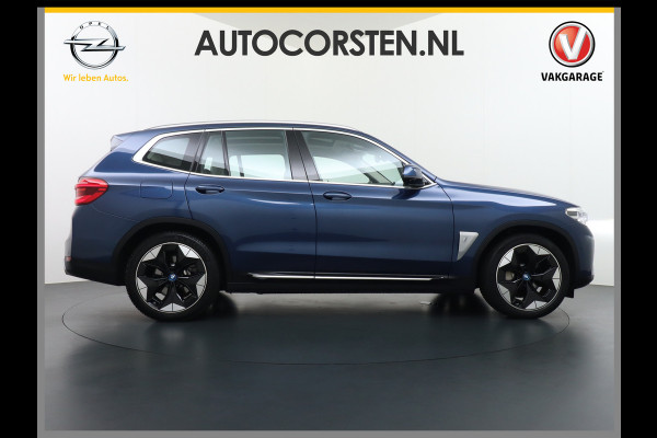 BMW iX3 High Executive 80kWh Leder Adap.Cruise Apple Carplay Android Auto Navi Ecc 360°Camera Panoramaschuifdak Harman&Kardon®SurroundSo Stoelverwarming Parkeer+Achteruitrij assistent Led Origineel Nederlandse Auto Zeer compleet!
