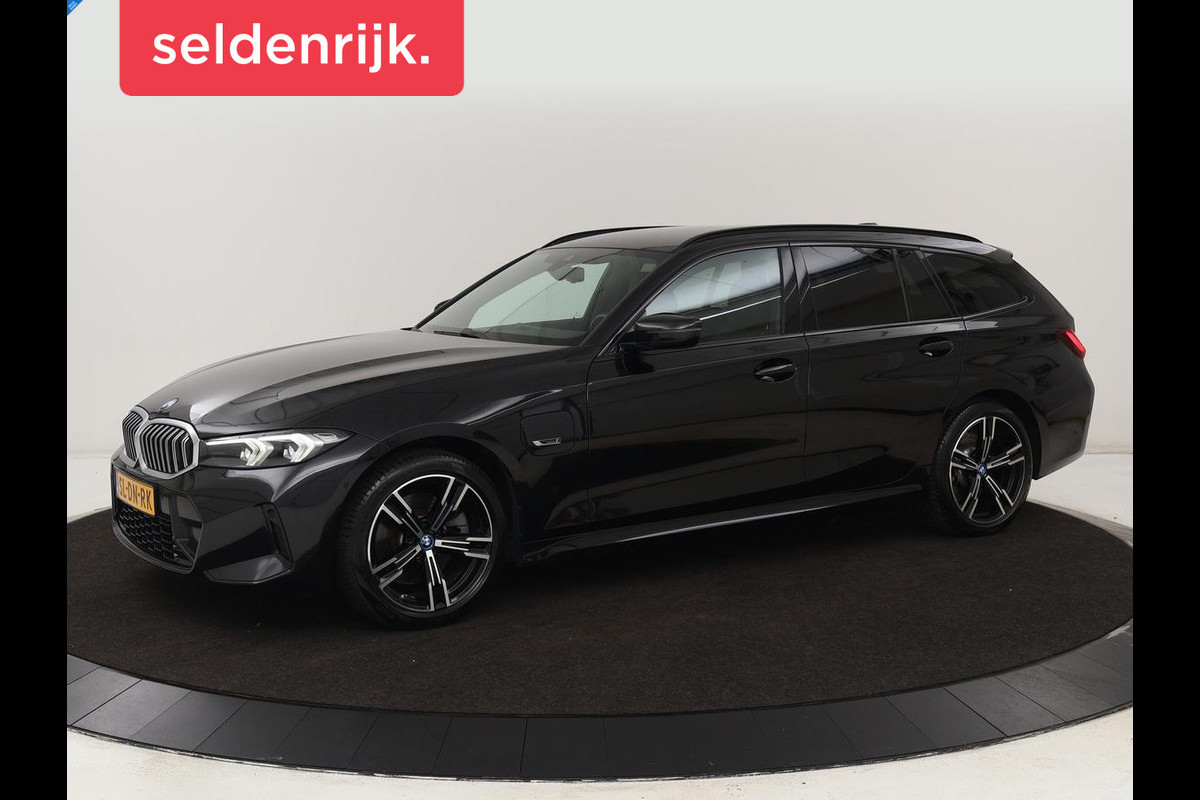 BMW 3 Serie Touring 330e Business Edition Plus | Wegklapbare trekhaak | Camera | Stoel & Stuurverwarming | Carplay | Leder