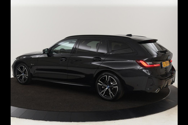 BMW 3 Serie Touring 330e Business Edition Plus | Wegklapbare trekhaak | Camera | Stoel & Stuurverwarming | Carplay | Leder