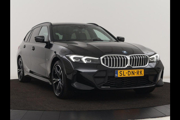 BMW 3 Serie Touring 330e Business Edition Plus | Wegklapbare trekhaak | Camera | Stoel & Stuurverwarming | Carplay | Leder