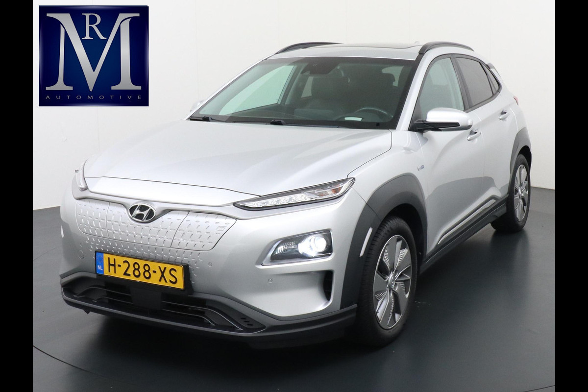 Hyundai Kona EV Premium 64 kWh 3-FASE LADER | ORIGINEEL NL AUTO MET NAP | SCHUIFDAK | LEDER | STOELVERWARMING & VERKOELING | HEAD-UP DISPLAY | AFN.TREKHAAK | RIJKLAAR MET 12 MAANDEN BOVAG GARANTIE! Hyundai Kona EV Premium 64 kWh 3-FASE LADER | ORIGINEEL NL AUTO MET NAP | SCHUIFDAK | LEDER | STOELVERWARMING & VERKOELING | HEAD-UP DISPLAY | AFN.TREKHAAK | RIJKLAAR MET 12 MAANDEN BOVAG GARANTIE!