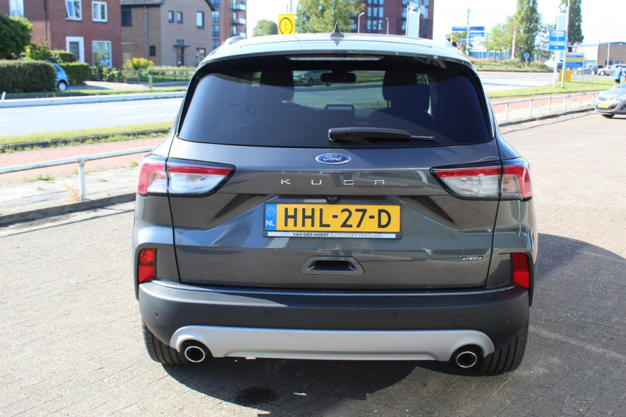 Ford Kuga 2.5-225pk PHEV Titanium X Plug-In Hybrid. Fabr. garantie t/m 07-04-2028 ! Slechts 10.000km ! Autm. airco dual, stoel-, stuur- en voorraamverw., LED verl., B&O soundsyst., metallic lak, cruise control, camera, LM wielen, elektr. achterklep en best. stoel etc.