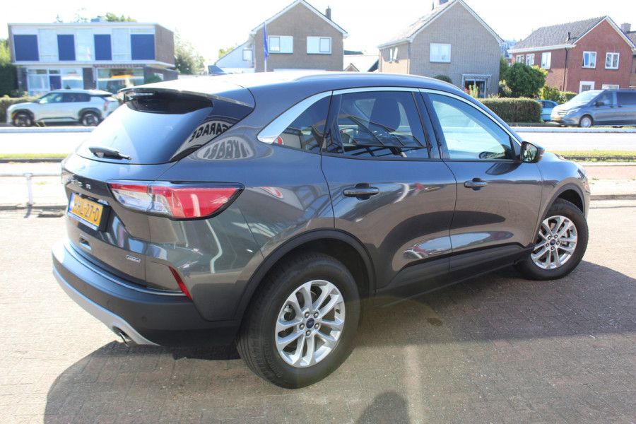 Ford Kuga 2.5-225pk PHEV Titanium X Plug-In Hybrid. Fabr. garantie t/m 07-04-2028 ! Slechts 10.000km ! Autm. airco dual, stoel-, stuur- en voorraamverw., LED verl., B&O soundsyst., metallic lak, cruise control, camera, LM wielen, elektr. achterklep en best. stoel etc.