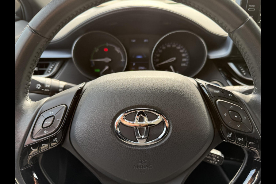 Toyota C-HR 1.8 Hybrid First Edition Bi-Tone | Apple Carplay & AndroidAUTO | Camera | Elektrisch inklapbare buitenspiegels |
