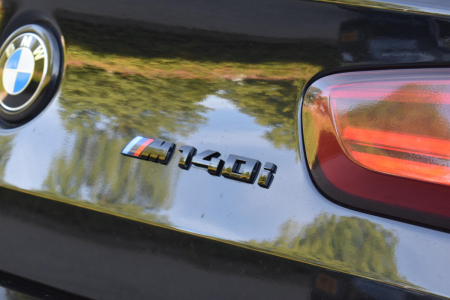 BMW 1-serie M140i High Executive Pano Camera Lane HK Leder NAP