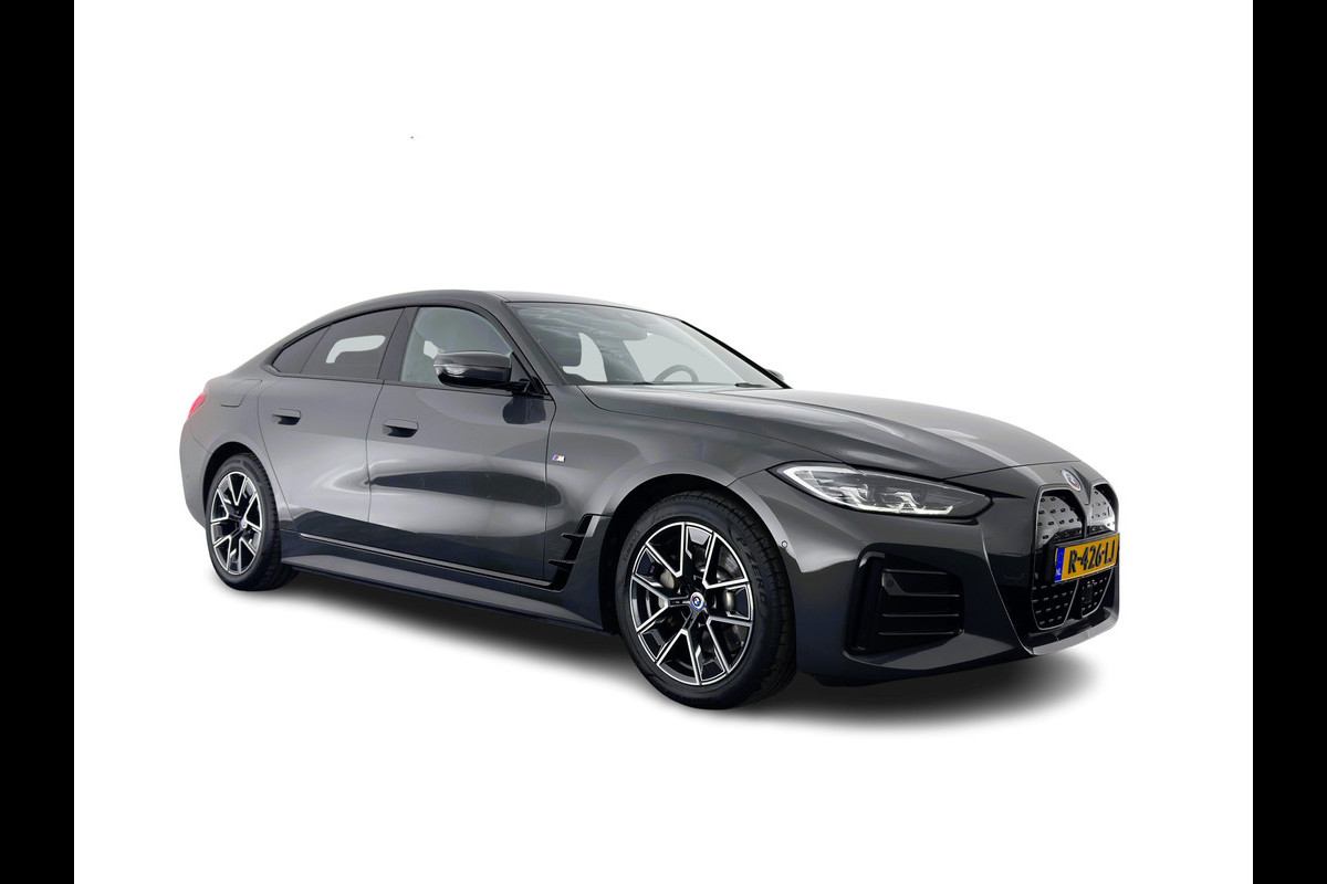 BMW i4 eDrive40 84 kWh M-Sportpack [ 3-Fase ] { SOH-95%} (INCL-BTW) *LEATHER-MICROFIBRE | FULL-LED | ADAPTIVE-CRUISE | WIDE-SCREEN-DIGI-COCKPIT | DAB+ | CAMERA | AMBIENT-LIGHT | CARPLAY | SPORT-SEATS | PRIVACY-GLASS | TOWBAR | 18''ALU*