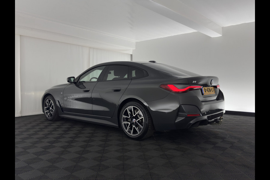 BMW i4 eDrive40 84 kWh M-Sportpack [ 3-Fase ] { SOH-95%} (INCL-BTW) *LEATHER-ALCANTARA | FULL-LED | ADAPTIVE-CRUISE | WIDE-SCREEN-DIGI-COCKPIT | DAB+ | CAMERA | AMBIENT-LIGHT | CARPLAY | SPORT-SEATS | PRIVACY-GLASS | TOWBAR | 18''ALU*