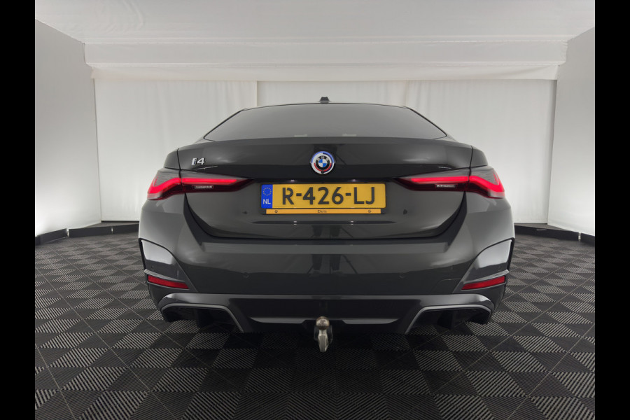 BMW i4 eDrive40 84 kWh M-Sportpack [ 3-Fase ] { SOH-95%} (INCL-BTW) *LEATHER-ALCANTARA | FULL-LED | ADAPTIVE-CRUISE | WIDE-SCREEN-DIGI-COCKPIT | DAB+ | CAMERA | AMBIENT-LIGHT | CARPLAY | SPORT-SEATS | PRIVACY-GLASS | TOWBAR | 18''ALU*