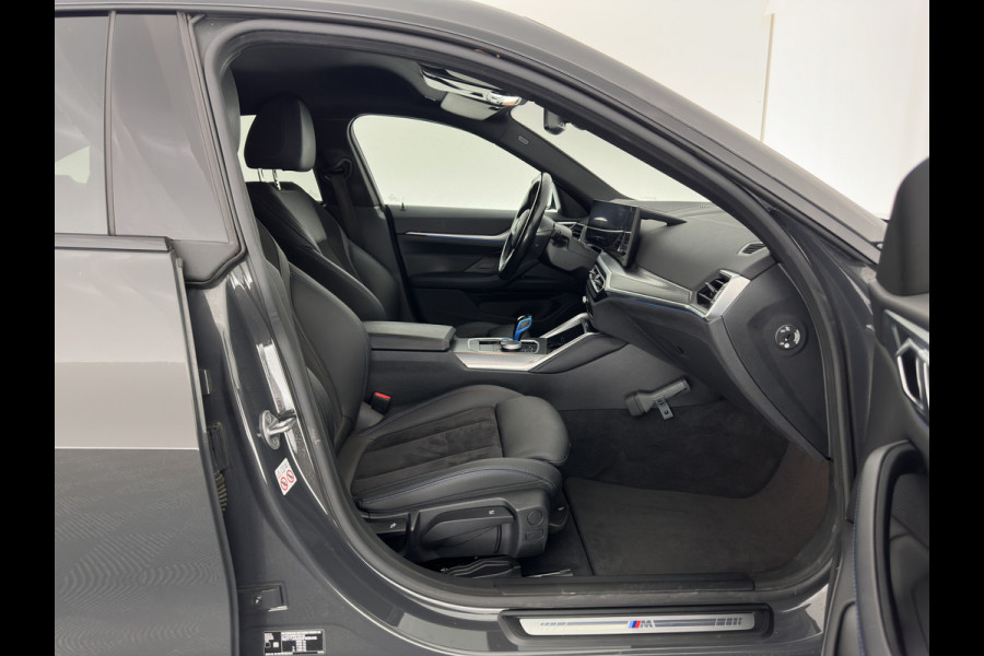 BMW i4 eDrive40 84 kWh M-Sportpack [ 3-Fase ] { SOH-95%} (INCL-BTW) *LEATHER-ALCANTARA | FULL-LED | ADAPTIVE-CRUISE | WIDE-SCREEN-DIGI-COCKPIT | DAB+ | CAMERA | AMBIENT-LIGHT | CARPLAY | SPORT-SEATS | PRIVACY-GLASS | TOWBAR | 18''ALU*