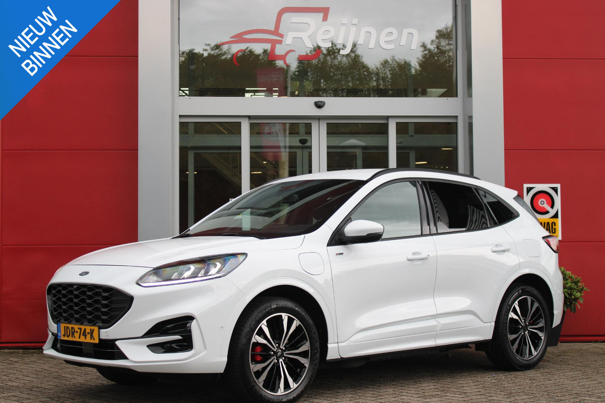 Ford Kuga 2.5 PHEV 225PK ST-LINE X | NAVIGATIE | STUUR / STOELVERWARMING | ACHTERBANK VERWARMING | DODEHOEKDETECTIE | ELEKTRISCH WEGKLAPBARE TREKHAAK | ACHTERUITRIJCAMERA | KEYLESS ENTRY / START | Ford Kuga 2.5 PHEV 225PK ST-LINE X | NAVIGATIE | STUUR / STOELVERWARMING | ACHTERBANK VERWARMING | DODEHOEKDETECTIE | ELEKTRISCH WEGKLAPBARE TREKHAAK | ACHTERUITRIJCAMERA | KEYLESS ENTRY / START |