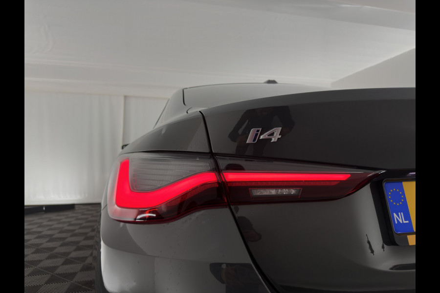 BMW i4 eDrive40 84 kWh M-Sportpack [ 3-Fase ] { SOH-95%} (INCL-BTW) *LEATHER-ALCANTARA | FULL-LED | ADAPTIVE-CRUISE | WIDE-SCREEN-DIGI-COCKPIT | DAB+ | CAMERA | AMBIENT-LIGHT | CARPLAY | SPORT-SEATS | PRIVACY-GLASS | TOWBAR | 18''ALU*