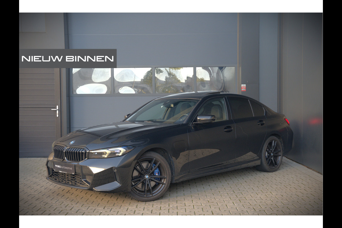 BMW 3-serie 320e High Executive M Sport | Panoramadak | Harman Kardon | Carbon | Camera | Adaptive LED | Stoelverwarming | Stuurverwarming | Apple Carplay | Navigatie | Cruise Control | Memory Seat | Trekhaak | Keyless | Shadowline