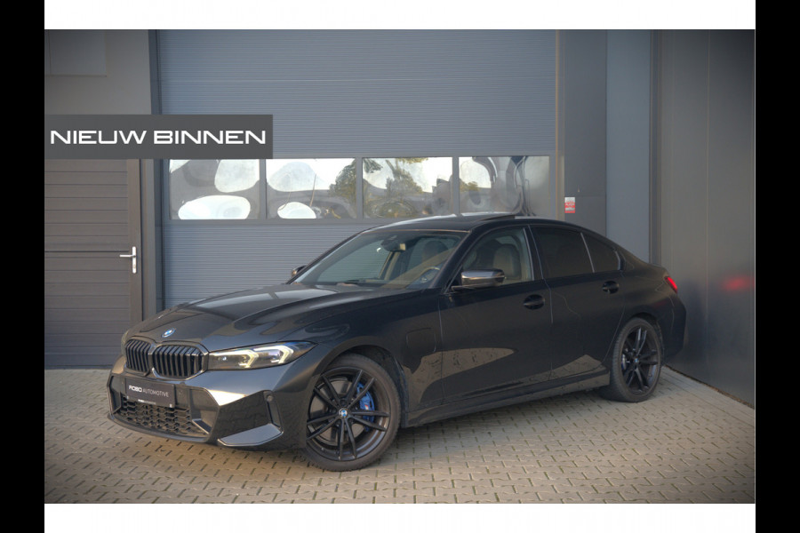 BMW 3-serie 320e High Executive M Sport | Panoramadak | Harman Kardon | Carbon | Camera | Adaptive LED | Stoelverwarming | Stuurverwarming | Apple Carplay | Navigatie | Cruise Control | Memory Seat | Trekhaak | Keyless | Shadowline