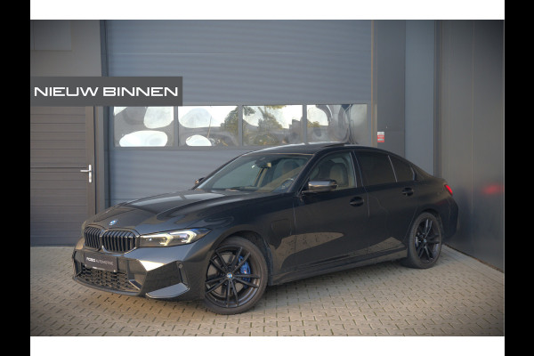 BMW 3-serie 320e High Executive M Sport | Panoramadak | Harman Kardon | Carbon | Camera | Adaptive LED | Stoelverwarming | Stuurverwarming | Apple Carplay | Navigatie | Cruise Control | Memory Seat | Trekhaak | Keyless | Shadowline