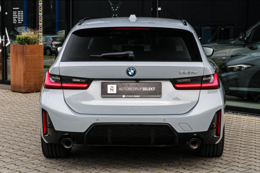 BMW 3 Serie Touring 320e - M-SPORT - PANO - CAMERA - BROOKLYN GREY