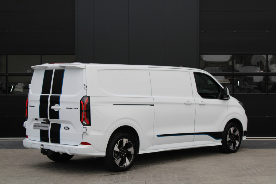 Ford Transit Custom 300 2.0 TDCI L2H1 Sport 170pk - 2x Schuifdeur - Trekhaak - ACC - 19'' LM Velgen - 70L Tank - Navi - Camera - Stoel & Stuurverwar Ford Transit Custom 300 2.0 TDCI L2H1 Sport 170pk - 2x Schuifdeur - Trekhaak - ACC - 19'' LM Velgen - 70L Tank - Navi - Camera - Stoel & Stuurverwar