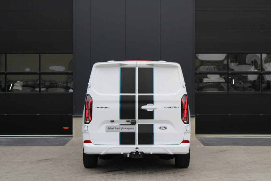 Ford Transit Custom 300 2.0 TDCI L2H1 Sport 170pk - 2x Schuifdeur - Trekhaak - ACC - 19'' LM Velgen - 70L Tank - Navi - Camera - Stoel & Stuurverwar Ford Transit Custom 300 2.0 TDCI L2H1 Sport 170pk - 2x Schuifdeur - Trekhaak - ACC - 19'' LM Velgen - 70L Tank - Navi - Camera - Stoel & Stuurverwar