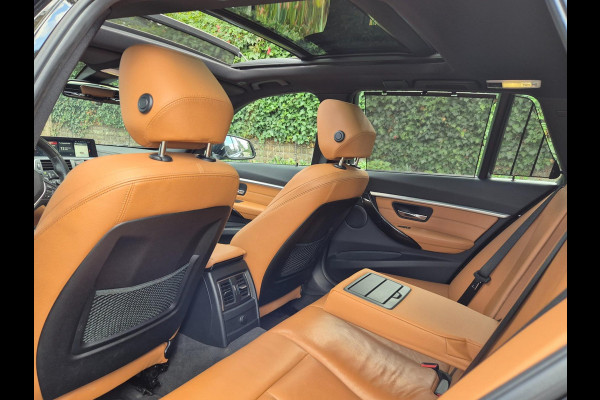 BMW 3 Serie Touring 320i Edition Luxury Line Purity Executive Pano Trekhaak HUD CarPlay NAP Navi Camera GARANTIE inbeg F31 LCI