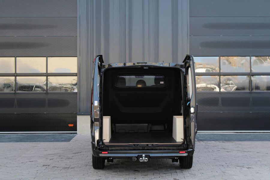 Renault Trafic 2.0 Blue dCi 170pk T29 L2H1 Extra DC - 2x Schuifdeur - Carplay - LED - Blind Spot - Navigatie - Camera - Trekhaak - Stoelverwarm Renault Trafic 2.0 Blue dCi 170pk T29 L2H1 Extra DC - 2x Schuifdeur - Carplay - LED - Blind Spot - Navigatie - Camera - Trekhaak - Stoelverwarm