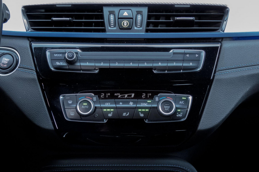 BMW X1 SDrive18i High Executive M-PAKKET | ADAPTIEVE CRUISE CONTROL | TREKHAAK | HEAD UP DISPLAY