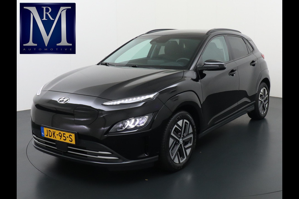 Hyundai Kona EV Fashion 64 kWh VAN: 29.900,- VOOR: 27.877- UW HERFSTVOORDEEL: 2.023,- VOLLEDIGE FABR. GARANTIE t/m 03-2028 | KEYLESS ENTRY | CAMERA | STOELVERWARMING | WARMTEPOMP | 3 fase LADEN