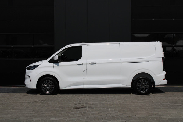 Ford Transit Custom 320 2.0 TDCI L2H1 Limited 170pk - 2x Schuifdeur - Adaptive Cruise - Verwarmd stuur - Blind spot - Navigatie - Camera - Draadloos Ford Transit Custom 320 2.0 TDCI L2H1 Limited 170pk - 2x Schuifdeur - Adaptive Cruise - Verwarmd stuur - Blind spot - Navigatie - Camera - Draadloos