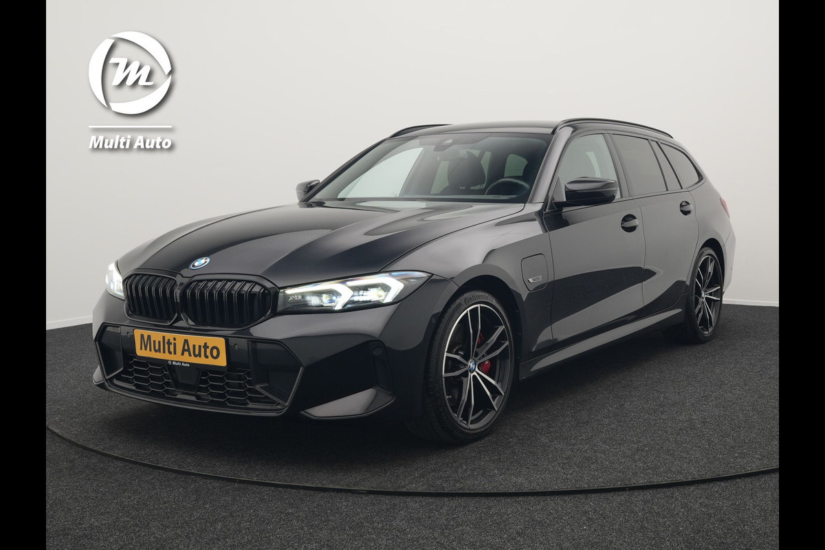 BMW 3 Serie Touring 330e M Sport Facelift Model Plug In Hybrid 292pk Dealer O.H PHEV | Widescreen Navi | Adaptive Cruise | Alcantara Sportstoelen Memory & Verwarmd | Camera | Sfeerverlichting | Apple Carplay | Blis | Keyless | DAB |