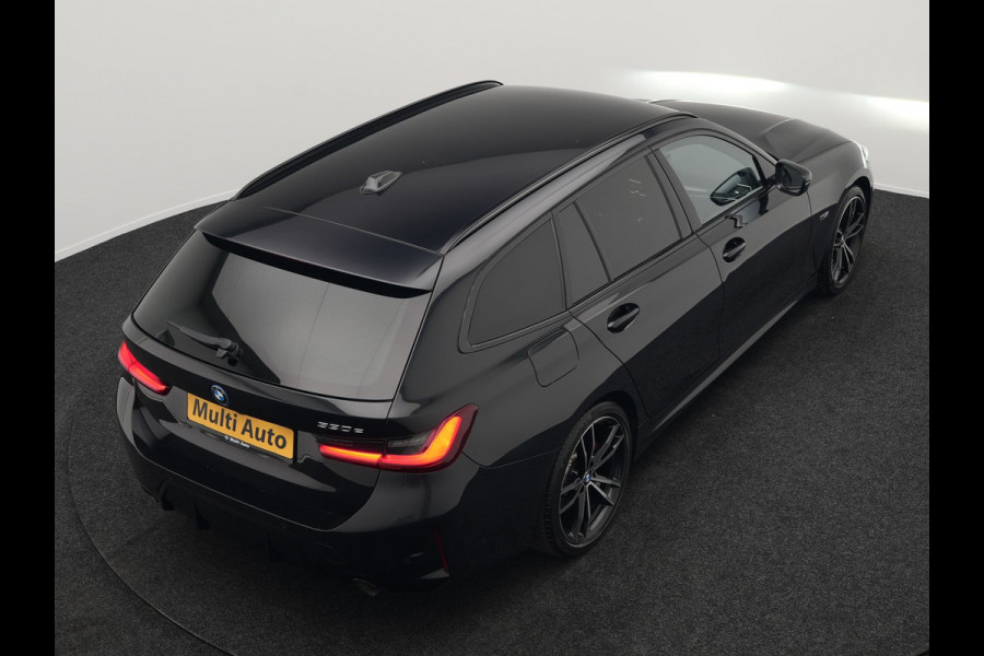 BMW 3 Serie Touring 330e M Sport Facelift Model Plug In Hybrid 292pk Dealer O.H PHEV | Widescreen Navi | Adaptive Cruise | Alcantara Sportstoelen Memory & Verwarmd | Camera | Sfeerverlichting | Apple Carplay | Blis | Keyless | DAB |