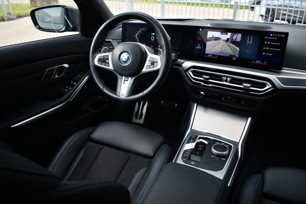 BMW 3 Serie Touring 330e xDrive M-Sport Pro LCI Dravitgrau Pano HUD el-zetels 19inch BMW 3 Serie Touring 330e xDrive M-Sport Pro LCI Dravitgrau Pano HUD el-zetels 19inch