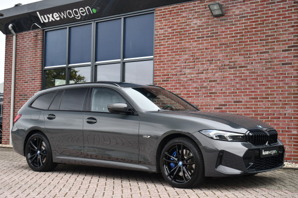 BMW 3 Serie Touring 330e xDrive M-Sport Pro LCI Dravitgrau Pano HUD el-zetels 19inch BMW 3 Serie Touring 330e xDrive M-Sport Pro LCI Dravitgrau Pano HUD el-zetels 19inch