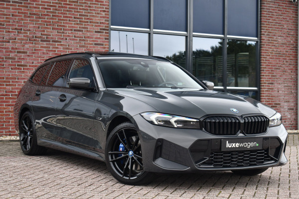 BMW 3 Serie Touring 330e xDrive M-Sport Pro LCI Dravitgrau Pano HUD el-zetels 19inch BMW 3 Serie Touring 330e xDrive M-Sport Pro LCI Dravitgrau Pano HUD el-zetels 19inch
