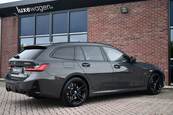 BMW 3 Serie Touring 330e xDrive M-Sport Pro LCI Dravitgrau Pano HUD el-zetels 19inch BMW 3 Serie Touring 330e xDrive M-Sport Pro LCI Dravitgrau Pano HUD el-zetels 19inch