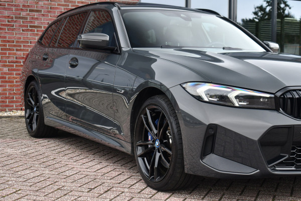 BMW 3 Serie Touring 330e xDrive M-Sport Pro LCI Dravitgrau Pano HUD el-zetels 19inch BMW 3 Serie Touring 330e xDrive M-Sport Pro LCI Dravitgrau Pano HUD el-zetels 19inch