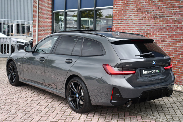 BMW 3 Serie Touring 330e xDrive M-Sport Pro LCI Dravitgrau Pano HUD el-zetels 19inch BMW 3 Serie Touring 330e xDrive M-Sport Pro LCI Dravitgrau Pano HUD el-zetels 19inch