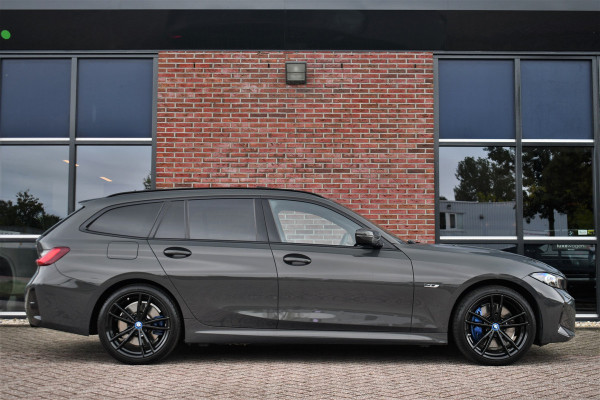 BMW 3 Serie Touring 330e xDrive M-Sport Pro LCI Dravitgrau Pano HUD el-zetels 19inch BMW 3 Serie Touring 330e xDrive M-Sport Pro LCI Dravitgrau Pano HUD el-zetels 19inch