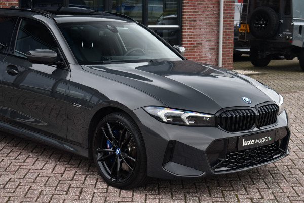 BMW 3 Serie Touring 330e xDrive M-Sport Pro LCI Dravitgrau Pano HUD el-zetels 19inch BMW 3 Serie Touring 330e xDrive M-Sport Pro LCI Dravitgrau Pano HUD el-zetels 19inch