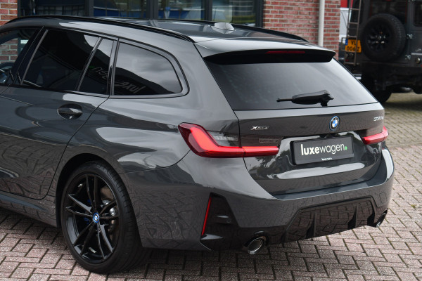 BMW 3 Serie Touring 330e xDrive M-Sport Pro LCI Dravitgrau Pano HUD el-zetels 19inch BMW 3 Serie Touring 330e xDrive M-Sport Pro LCI Dravitgrau Pano HUD el-zetels 19inch