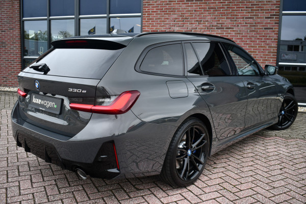 BMW 3 Serie Touring 330e xDrive M-Sport Pro LCI Dravitgrau Pano HUD el-zetels 19inch BMW 3 Serie Touring 330e xDrive M-Sport Pro LCI Dravitgrau Pano HUD el-zetels 19inch