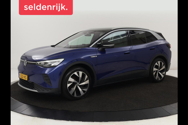 Volkswagen ID.4 First 77 kWh | Trekhaak | Sfeerverlichting | Camera | Navigatie | Stoelverwarming | Carplay | LMV 20 inch | LED | Cruise Control | Getint glas | Climate controle